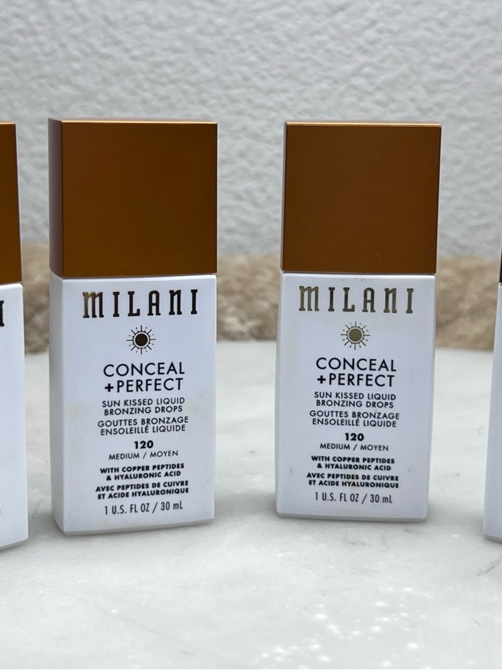 Milani Conceal + Perfect Liquid Bronzing Drops in Brown Cap